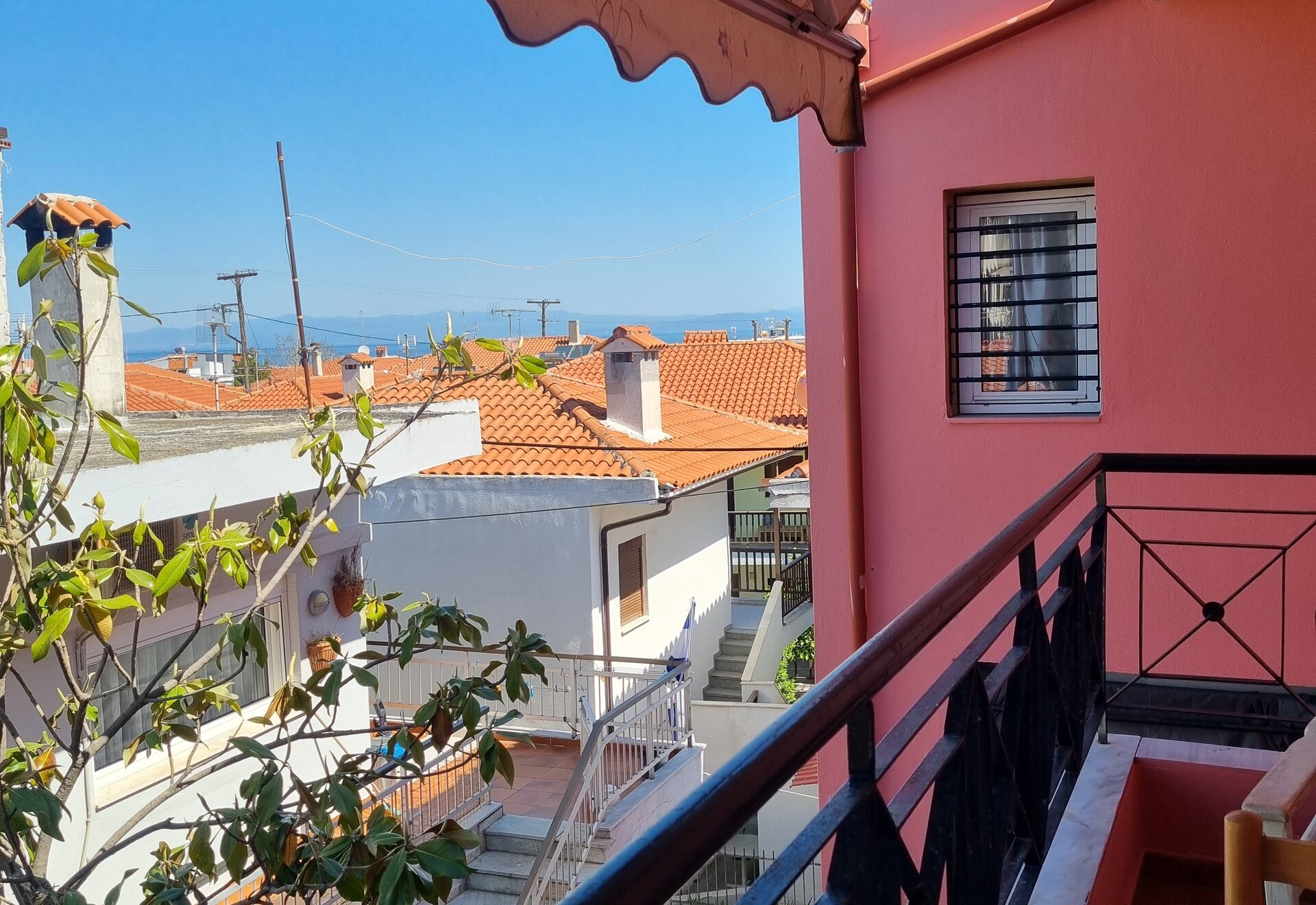Polychrono Coral Balcony Apartment neighborhood view from the balcony