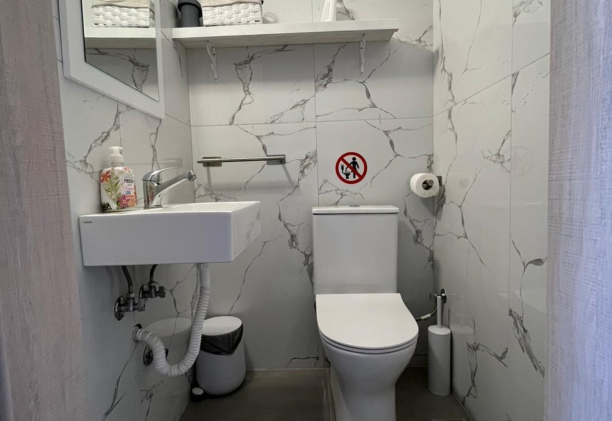 Aegean Dream bathroom with toilet and vanity