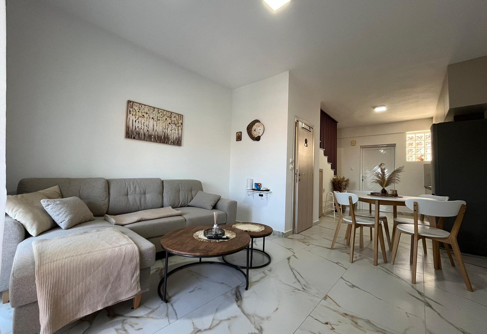 Aegean Dream living room sofa and dining area