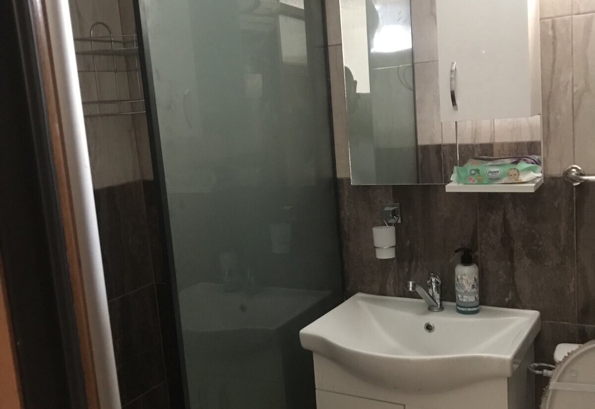 Garden Haven Apartment with Garden View bathroom with shower cabin and vanity