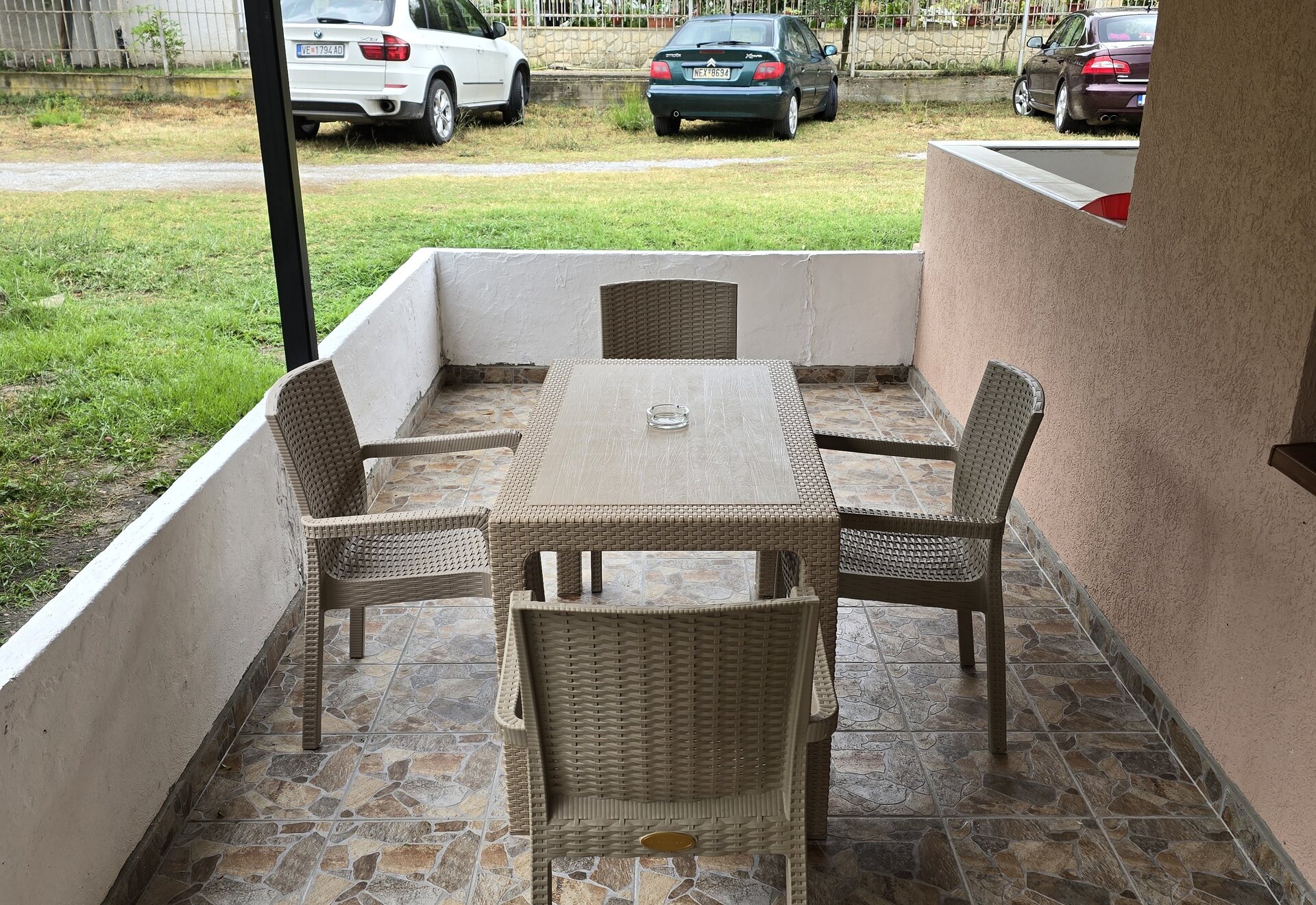 Garden Haven Apartment with Garden View terrace with outdoor dining furniture
