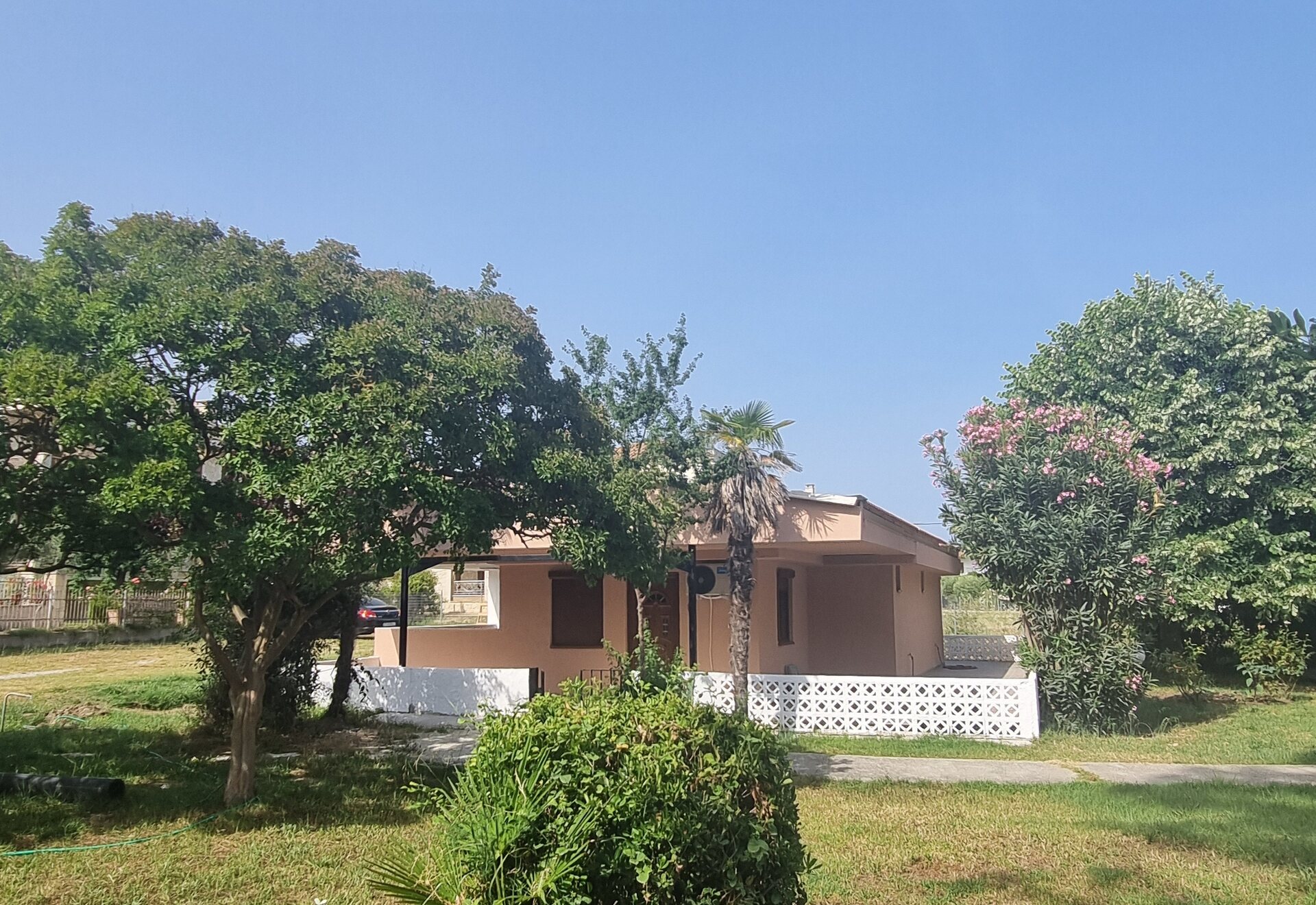 Garden Haven Two-Bedroom Apartment with Garden View garden lawn and apartment building