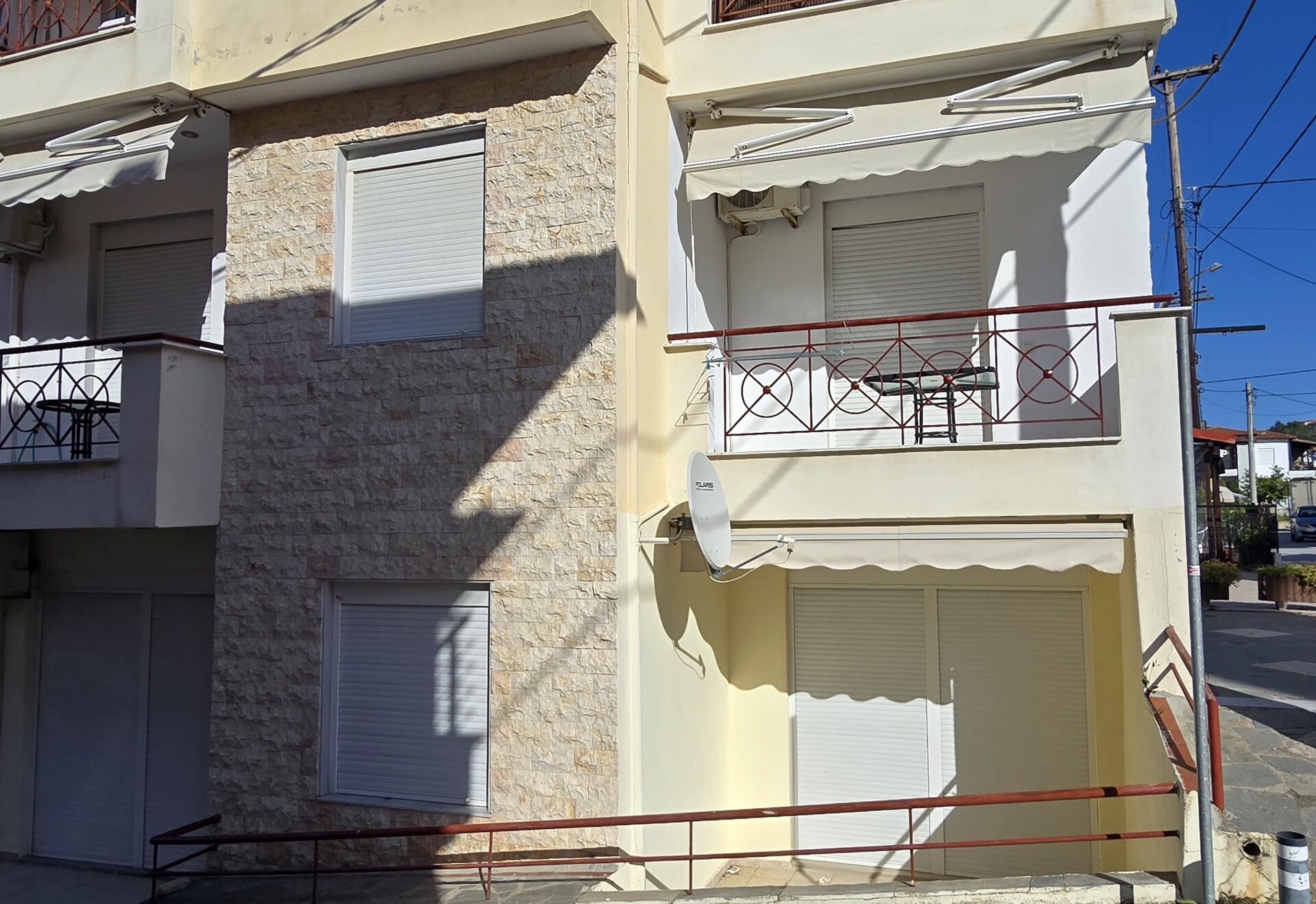 Polychrono Two Bedroom Apartment building exterior with balconies